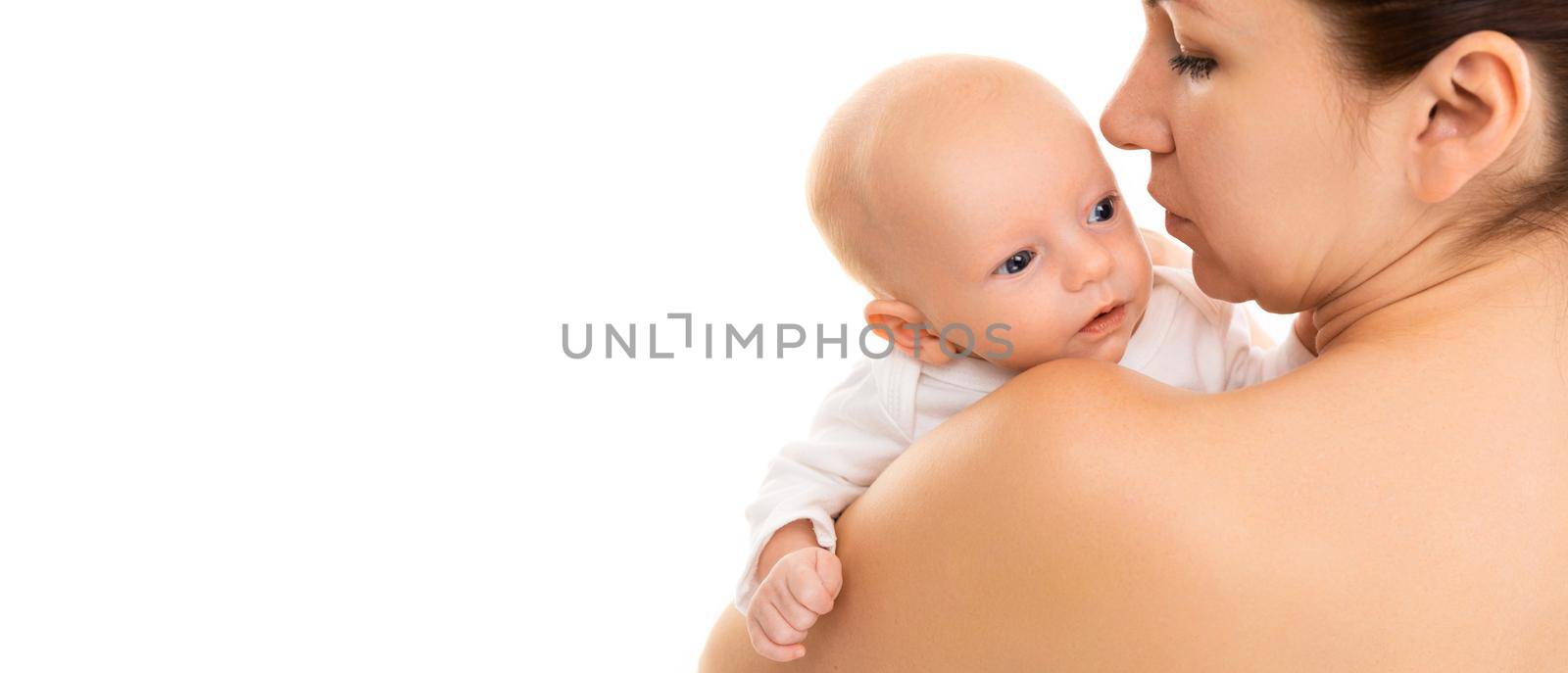 A curious baby looks over the shoulder of a mother, learns a new world by TRMK