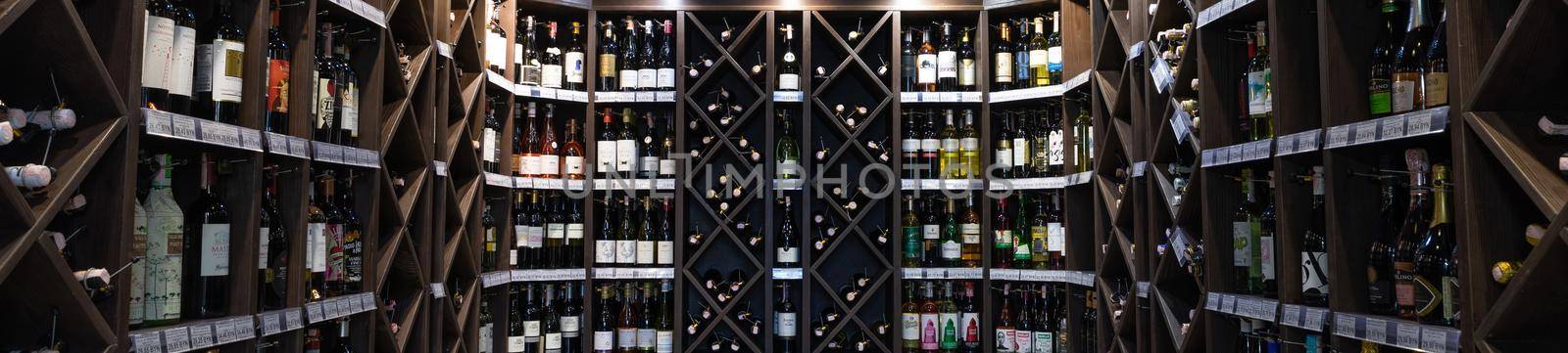 Minsk, Belarus - Dec 20, 2021: interior of a shop selling alcoholic beverages in aged wines and beers by TRMK