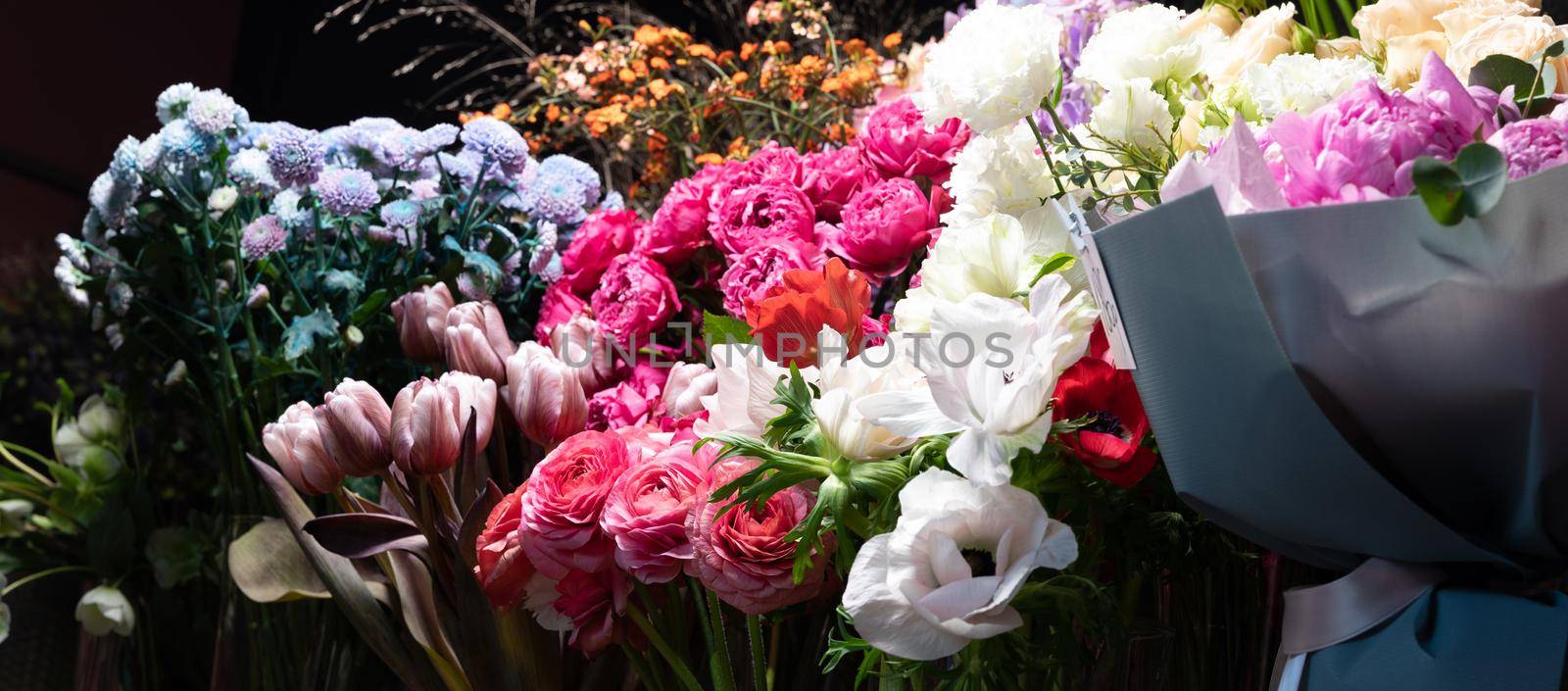 floristic arrangement of fresh cut flowers on a store shelf by TRMK