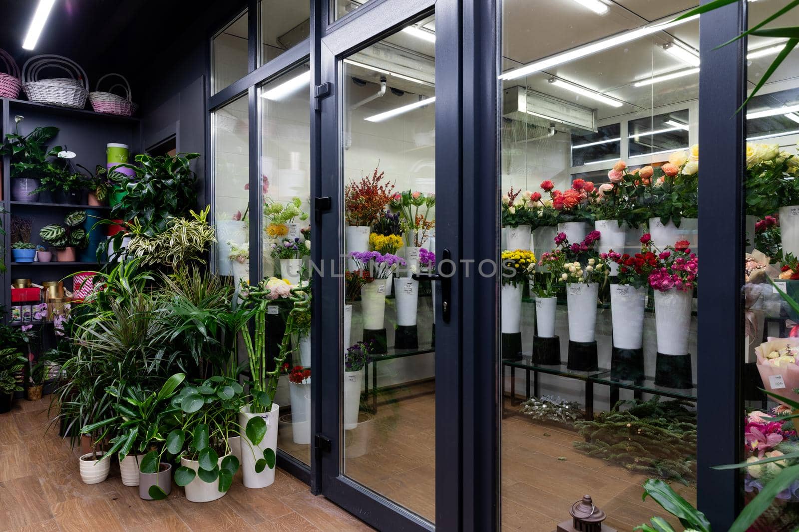 showcase of a florist shop selling natural flowers with bouquets in a refrigeration unit