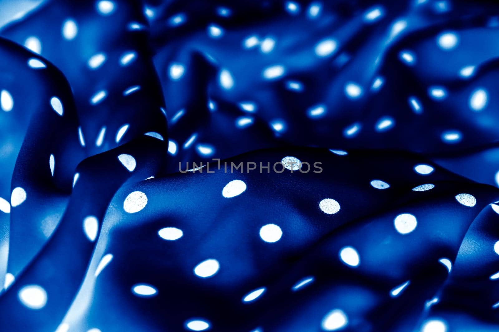 Fashion design, interior decor and vintage material concept - Classic polka dot textile background texture, white dots on blue luxury fabric design pattern