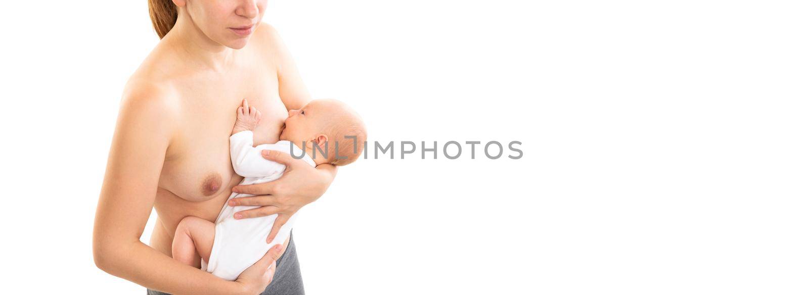 newborn takes mother's breast drinking milk on a white background by TRMK