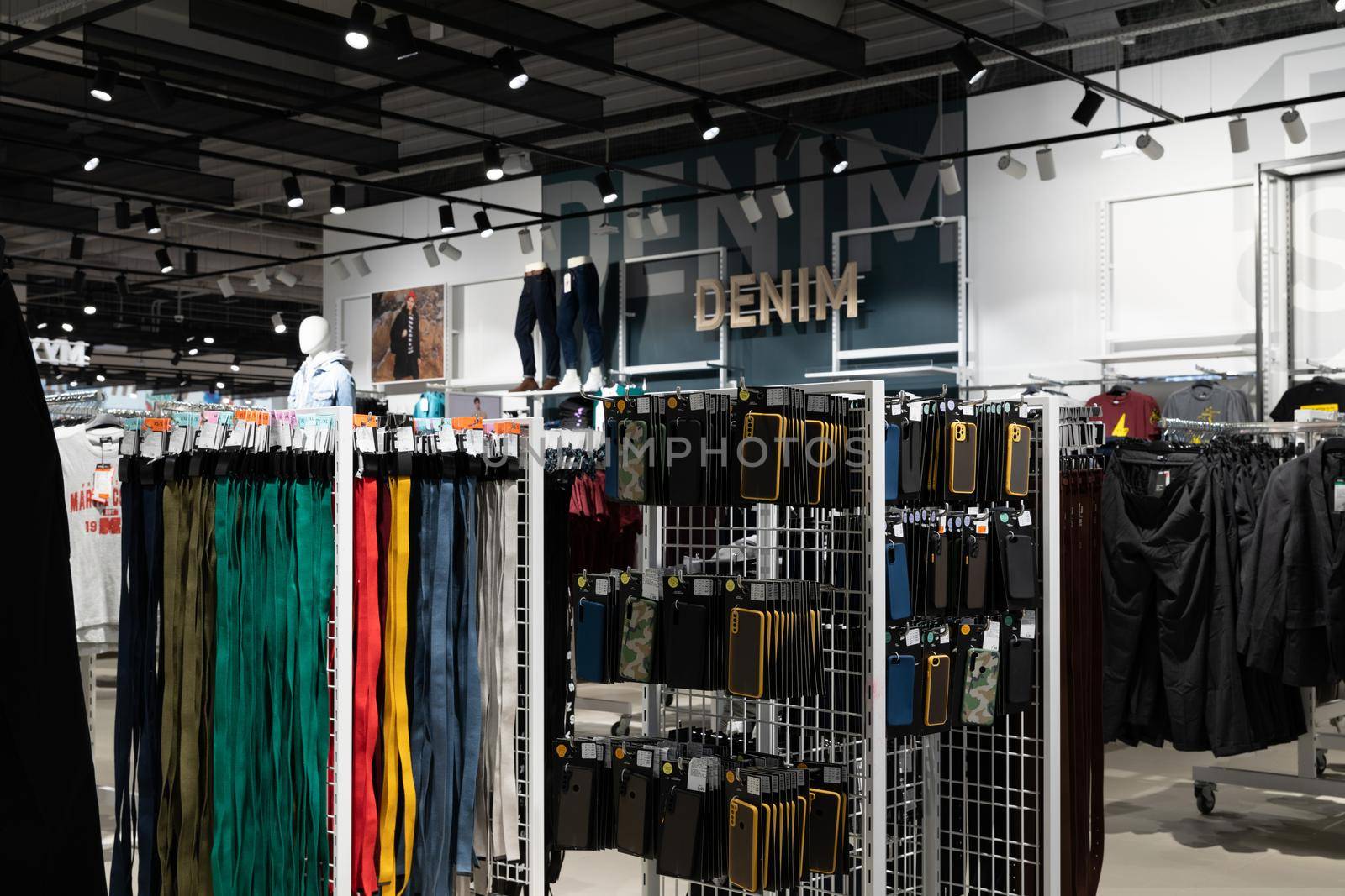 interior of a large store selling clothes and accessories in a mall, discount time concept.