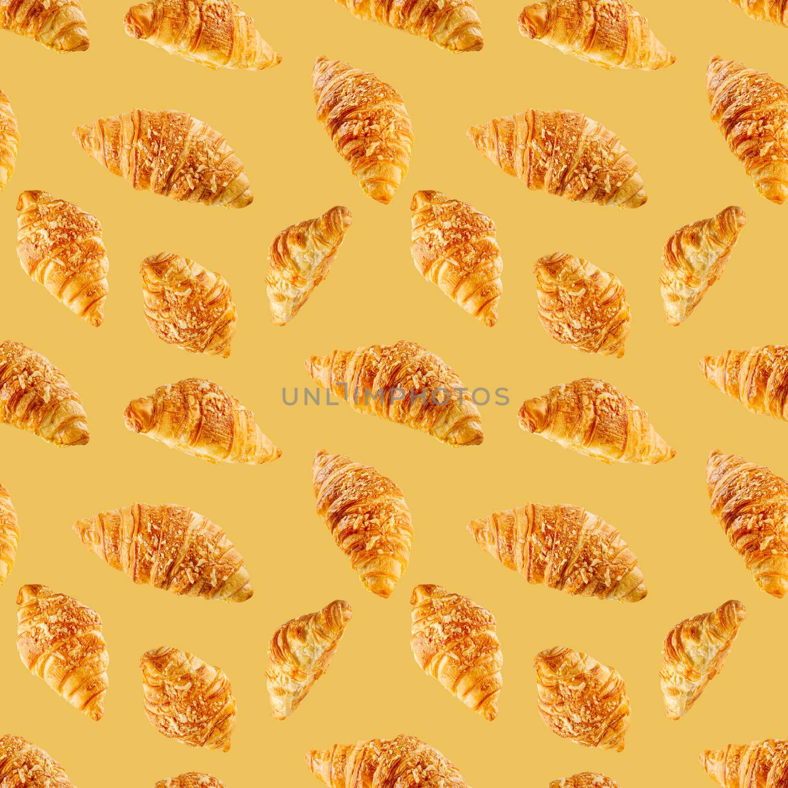 seamless pattern made from Fresh croissant isolated on brown background. Bakery pattern with baked croissant with cheese.