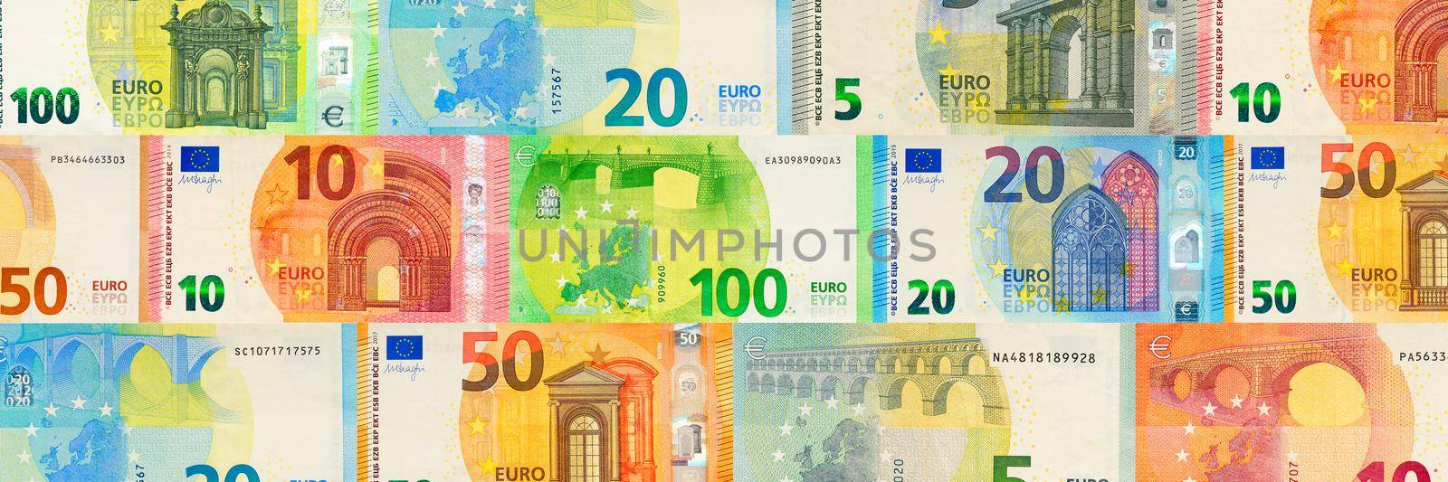 Euro banknotes creative layout. Background from European banknotes, euro by PhotoTime