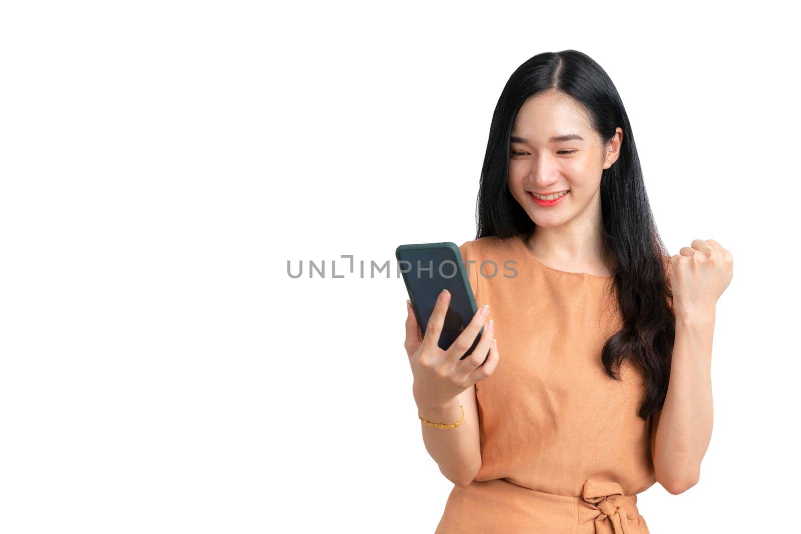 Beautiful Asian woman holding smartphone for business online.  Success business