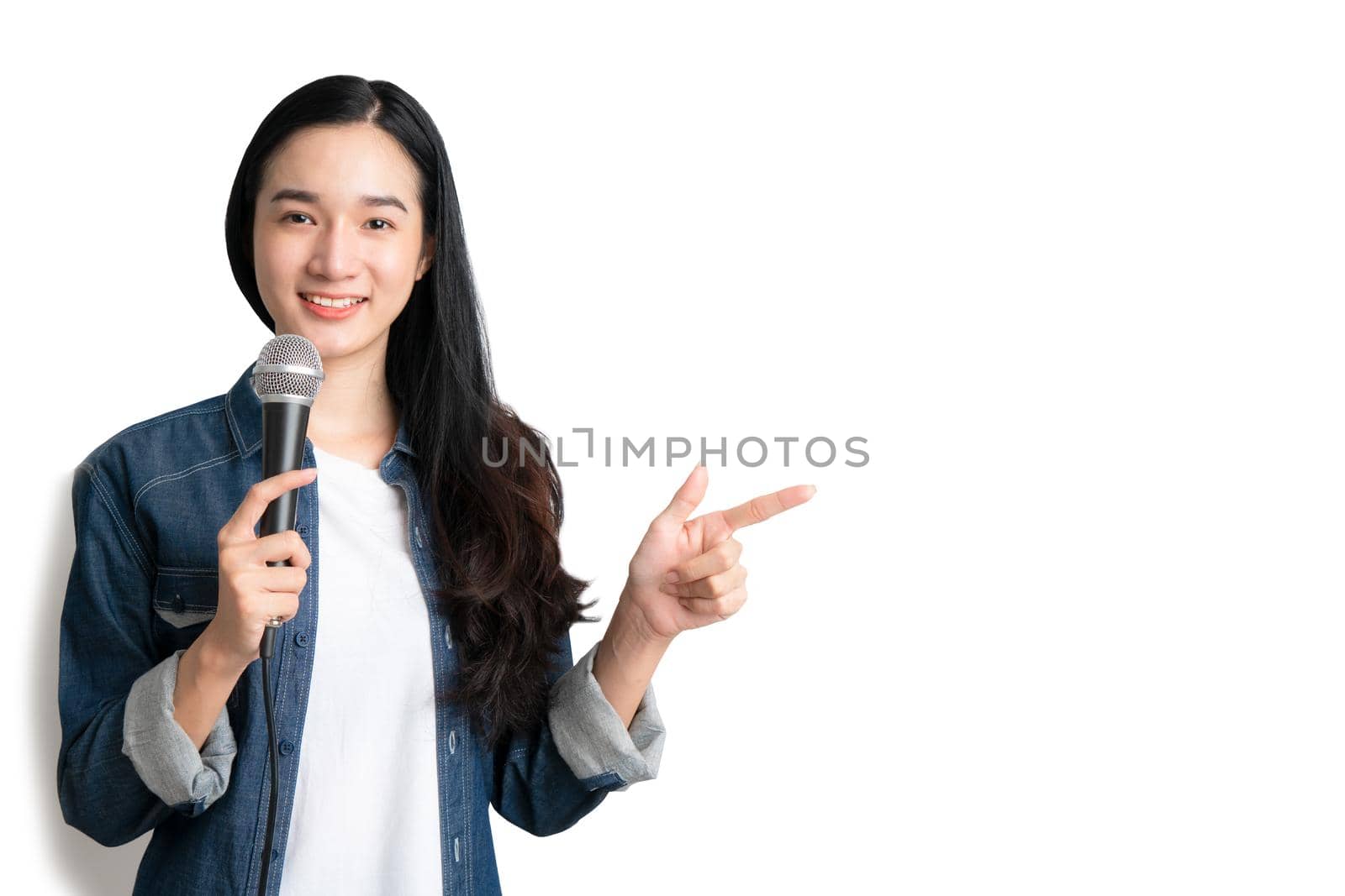 Asia woman holding microphone with copy space on white background