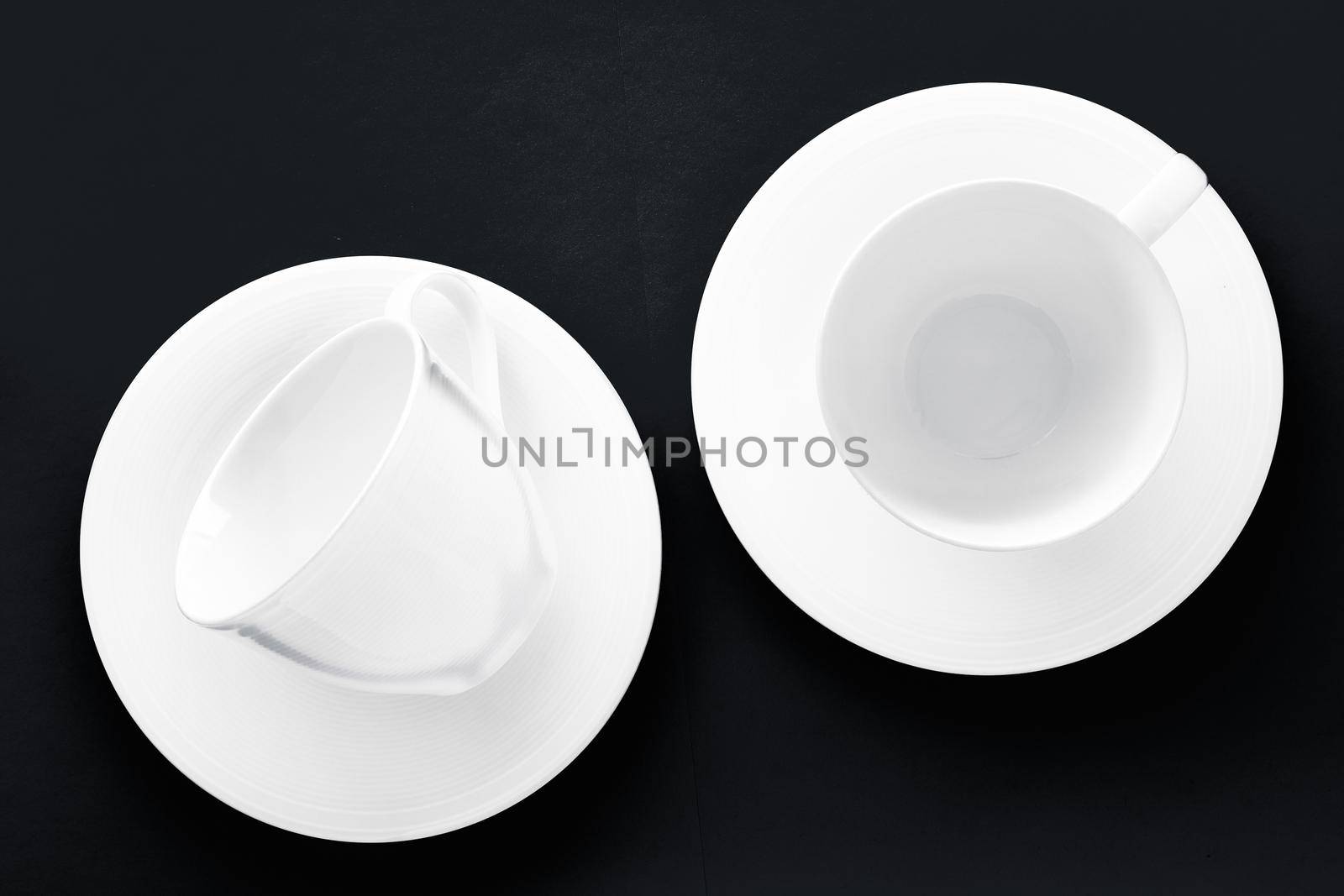 Kitchen, table decor and drinks menu concept - White tableware crockery set, empty cup on black flatlay background