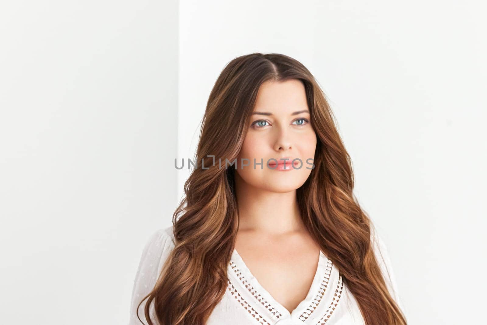 Natural beauty, haircare and feminine hairstyle, face portrait of beautiful woman with long hair on white background, close-up