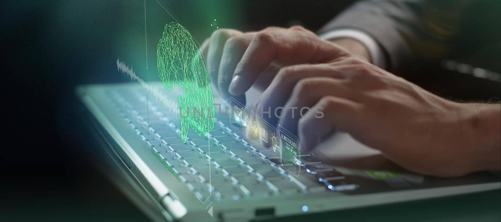 Close-up of male hands typing on keyboard and virtual infographics on the theme of education, intelligence development and brain function.