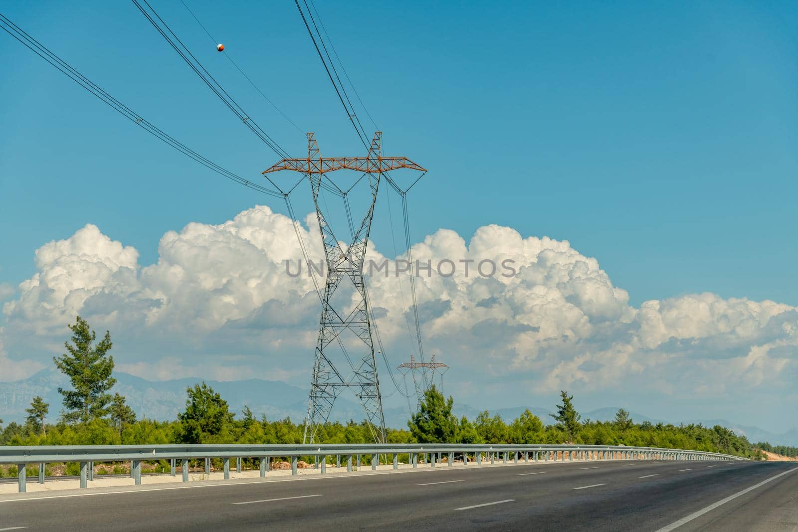 Electric power poles High voltage electrical power poles along a national highway by Sonat