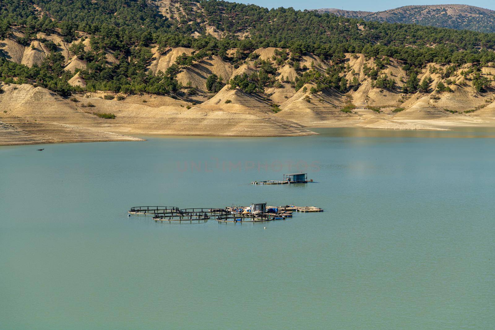 Aerial photo of fish farm in Antalya Korkuteli dam lake on a sunny day by Sonat