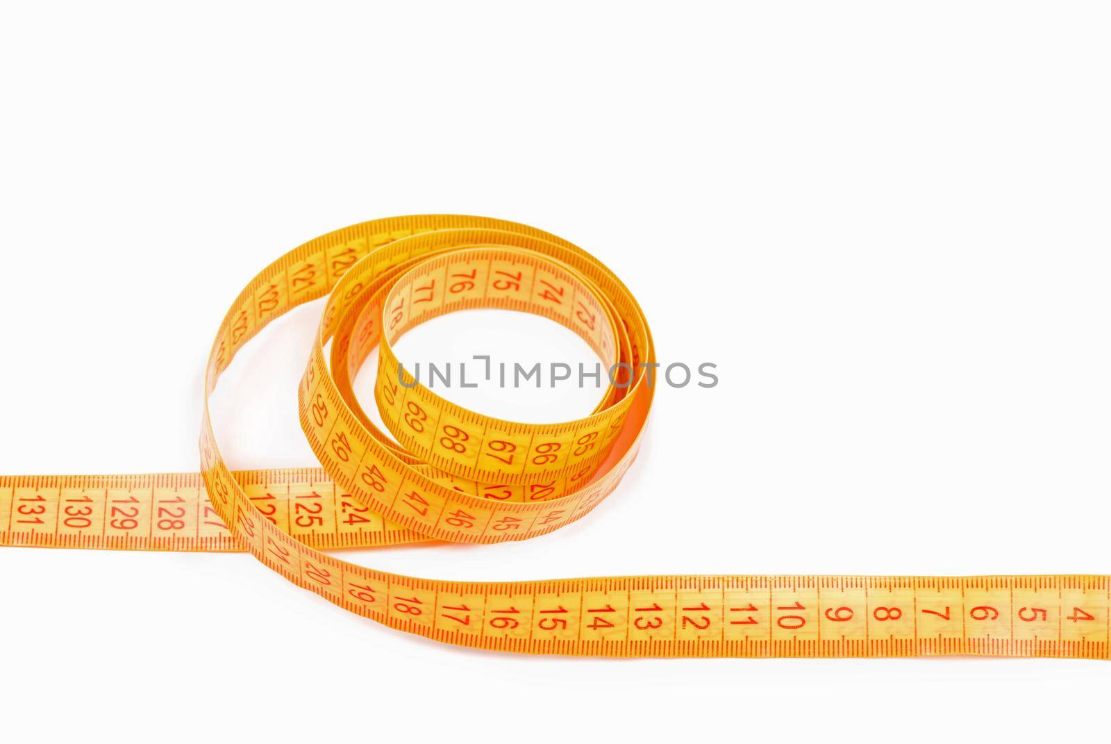 yellow measuring tape isolated on a white background by aprilphoto