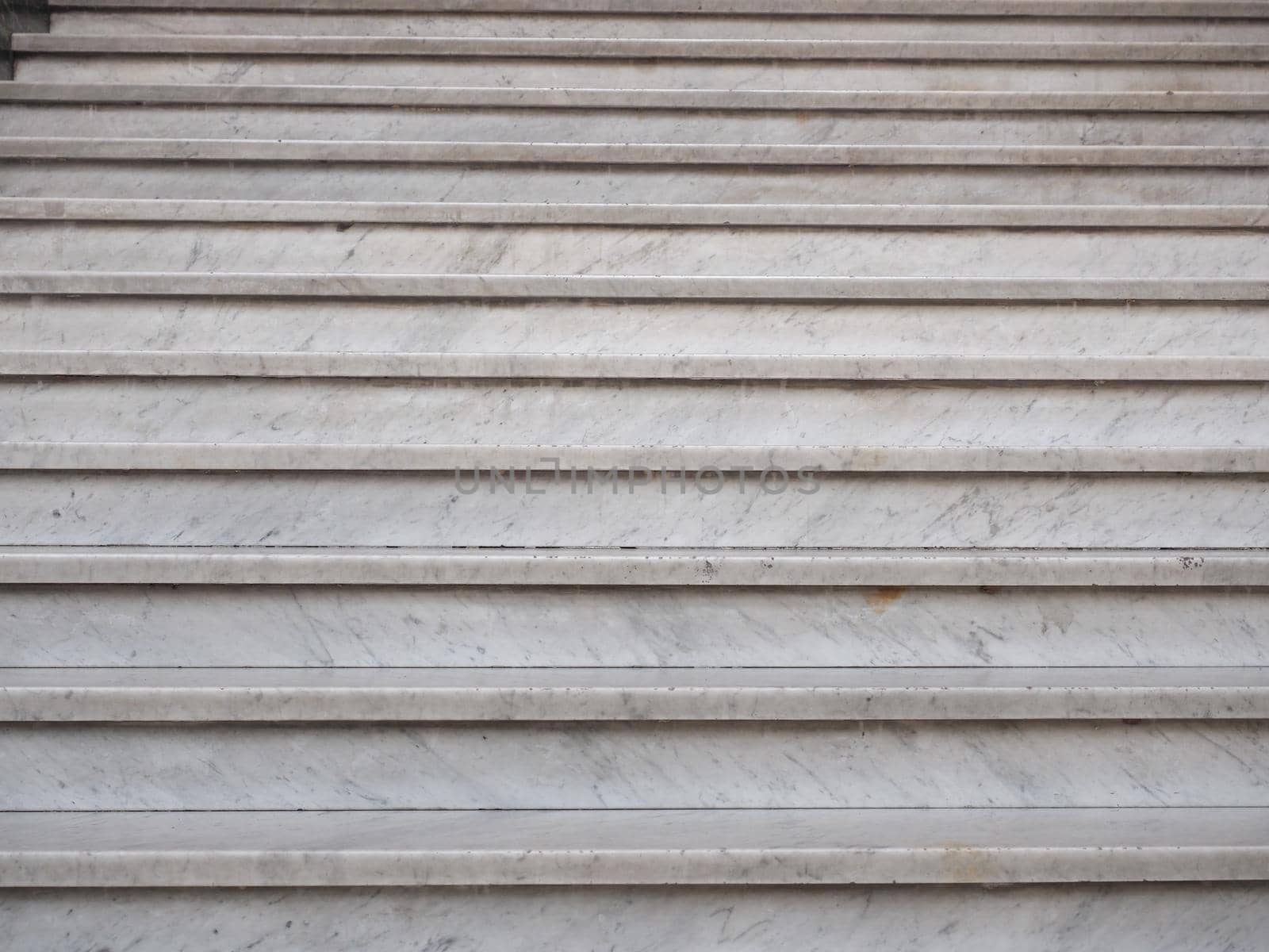 white marble stairway steps by claudiodivizia