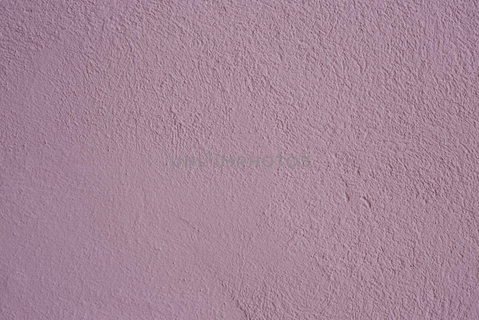 Beautiful purple textured stucco on the wall. by gelog67