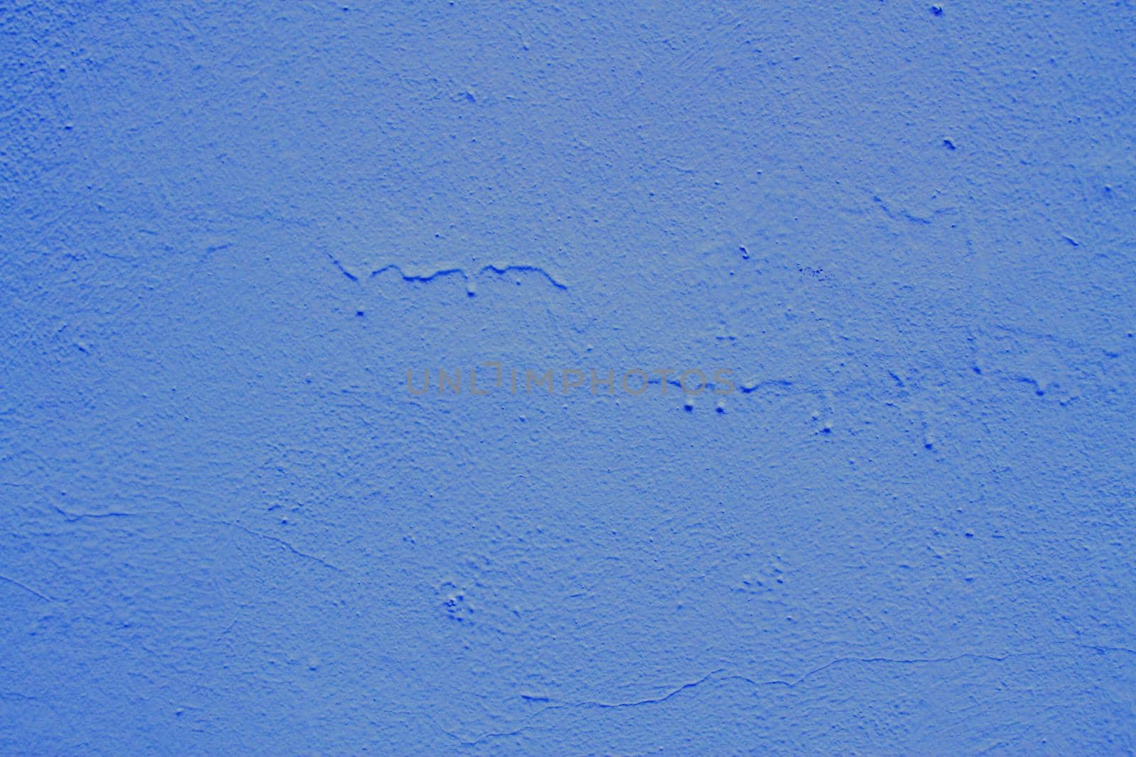 Beautiful blue textured plaster on the wall. by gelog67