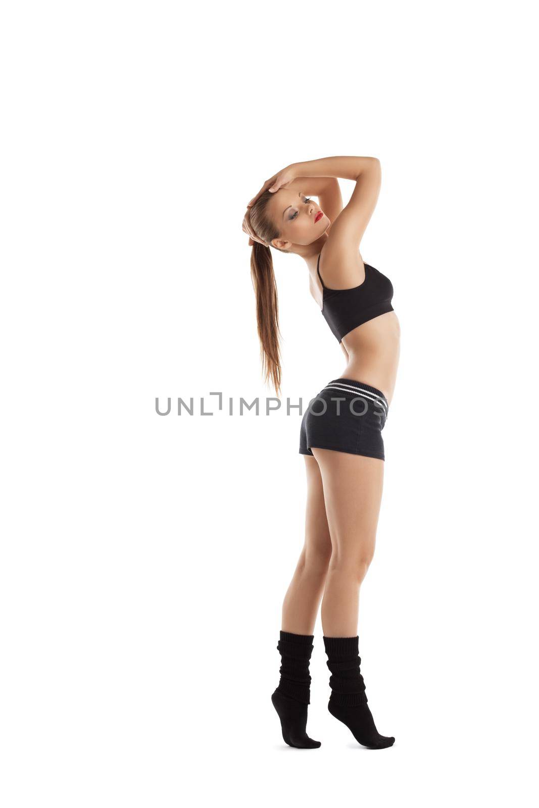 happy young woman dance in fitness cloth by rivertime