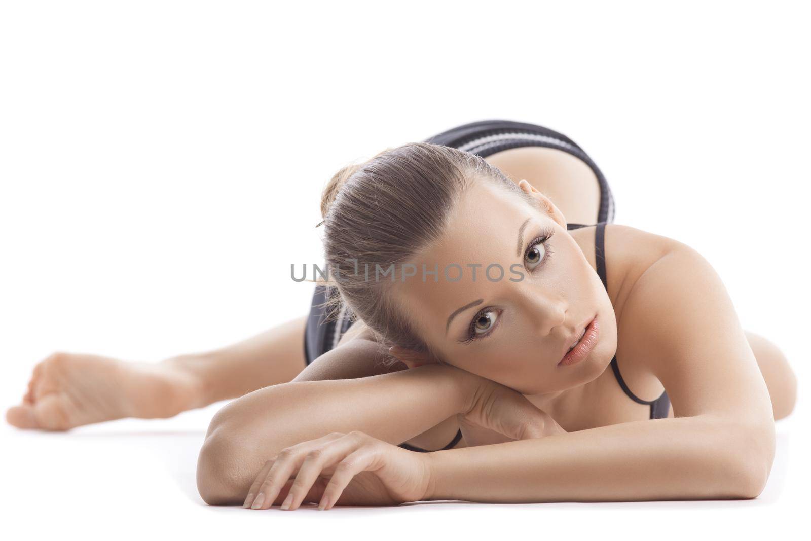 young woman portait relax after fitness program in black on white