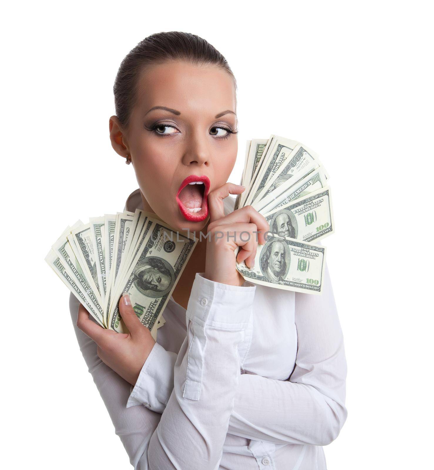 young sexy woman with bundle of money wipe a red mouth isolated