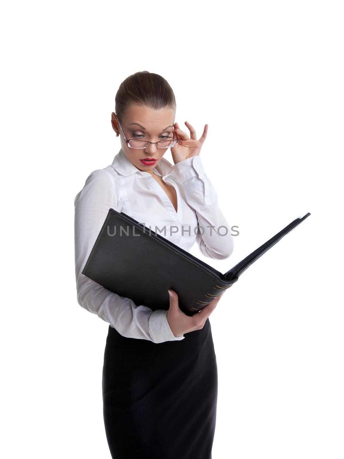 Sexy business woman look in ledger book and glasses isolated