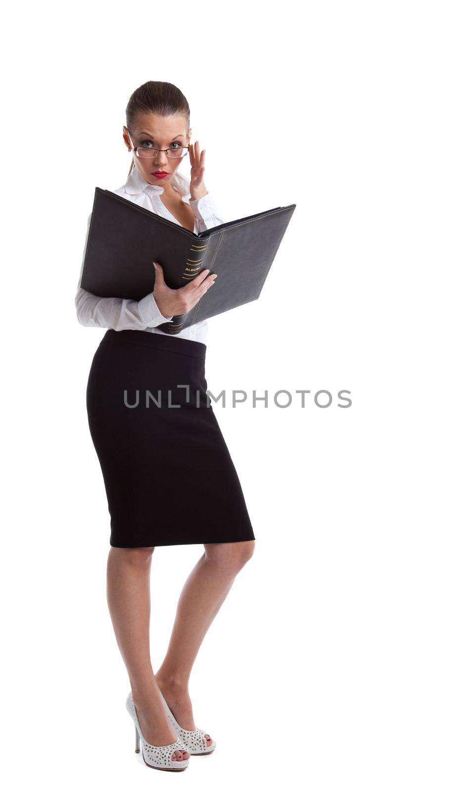 Sexy business woman look in ledger book and glasses isolated