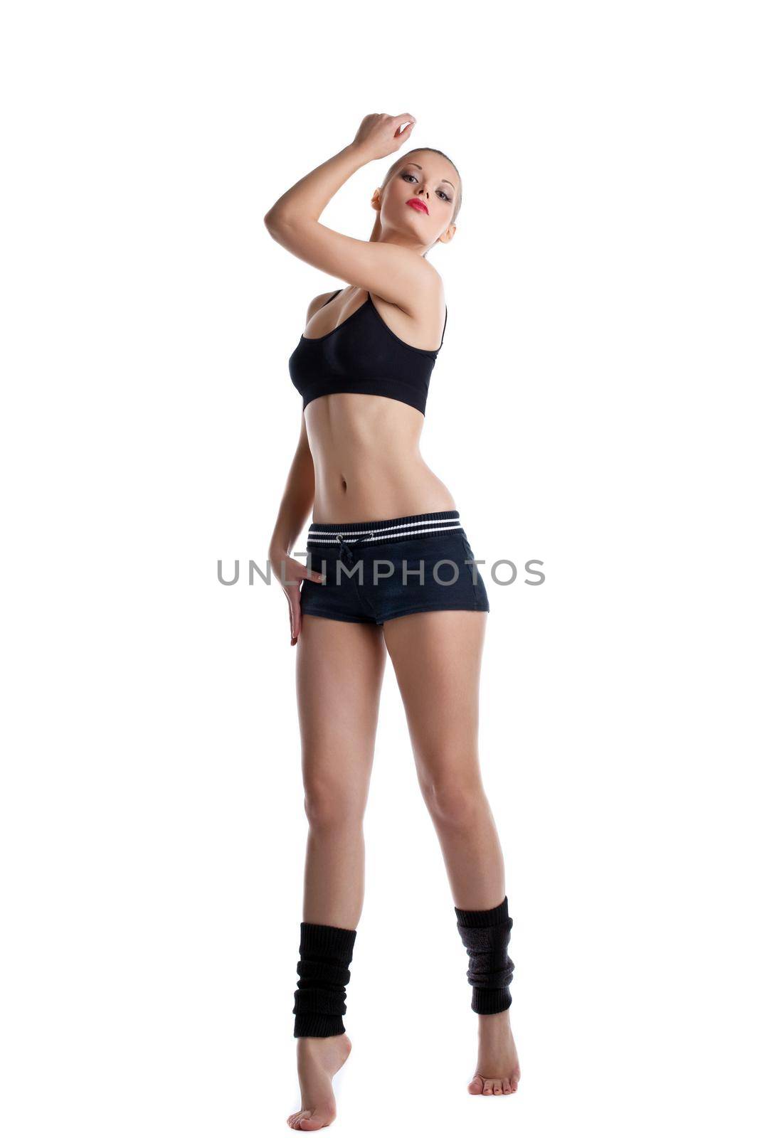 happy young woman stand in fitness dress by rivertime