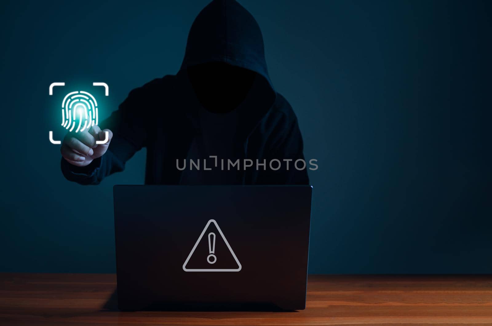 Hackers work on laptops in the dark. The concept of information security in the Internet network and information espionage. by Unimages2527