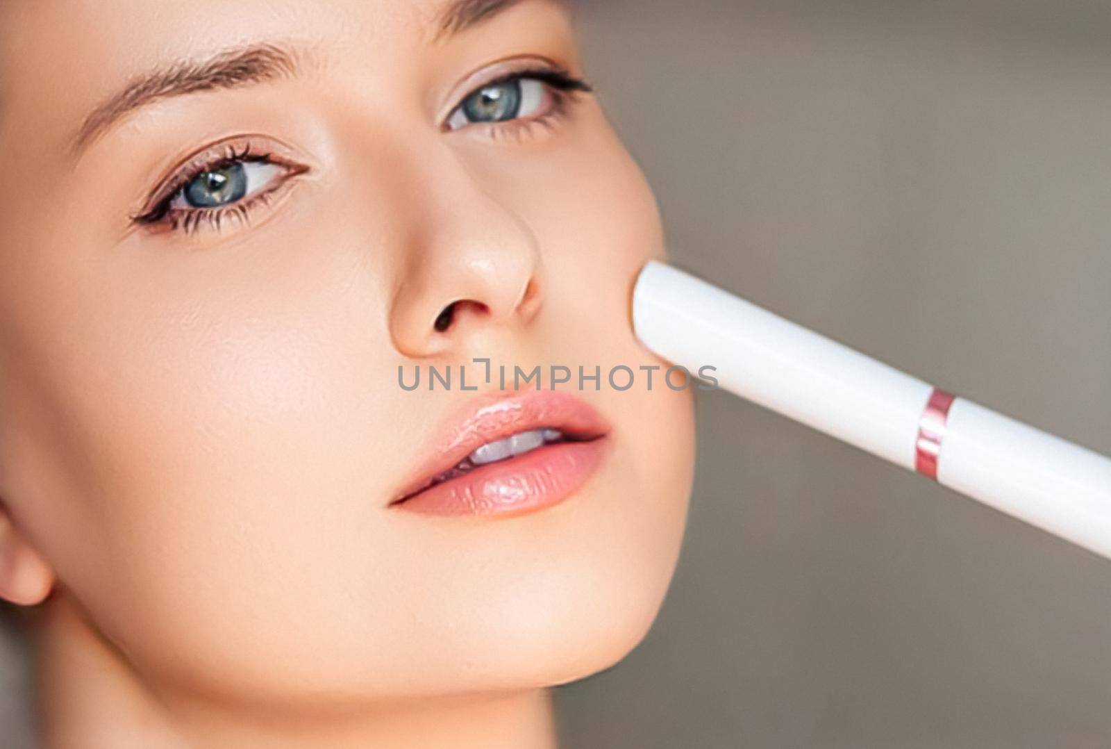Anti aging cosmetology and beauty treatment product, woman using laser device for skin resurfacing as rejuvenation procedure and skincare routine, close-up