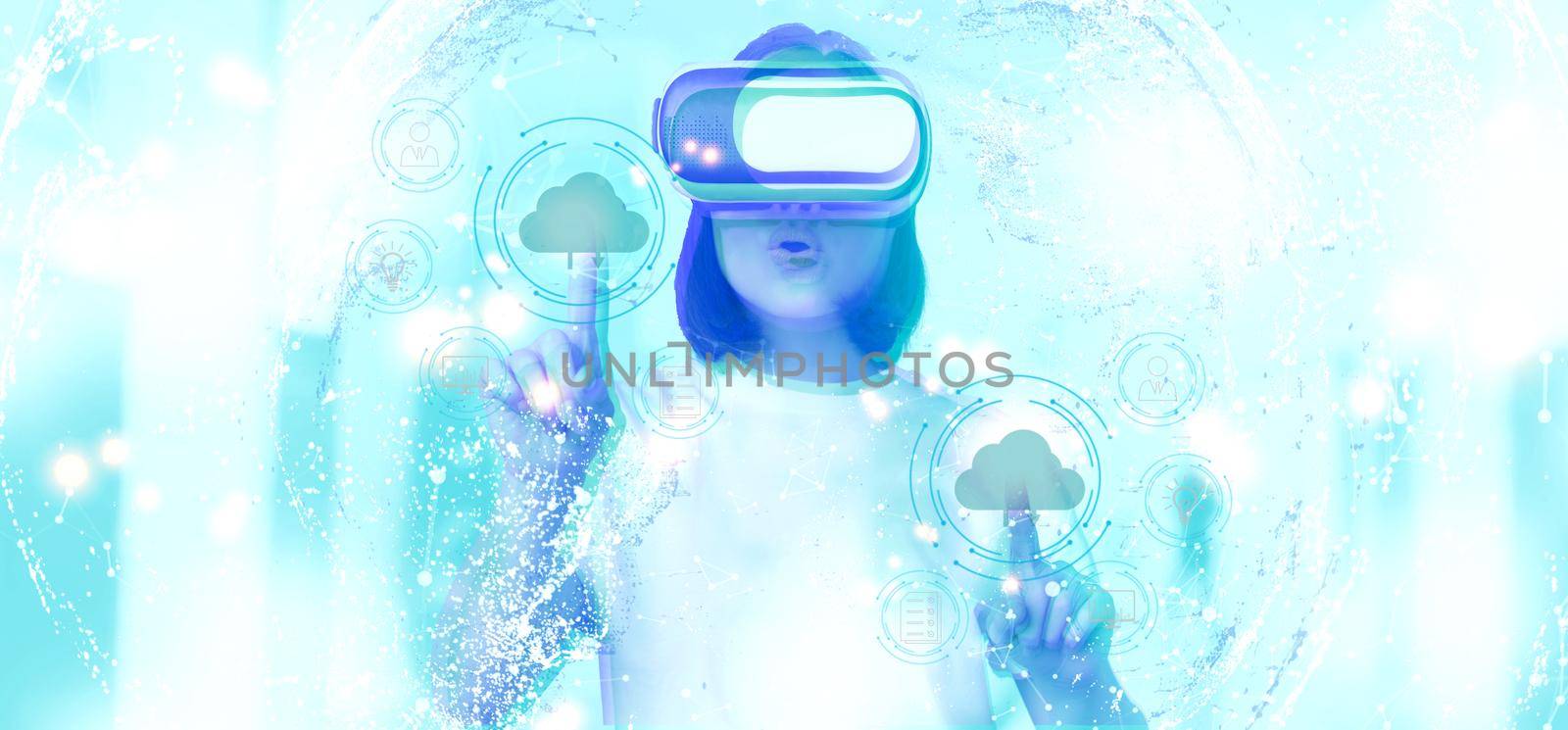 Potrait of asian woman in virtual reality glasses, pointing, choosing smth in VR headset, standing over white background by Benzoix