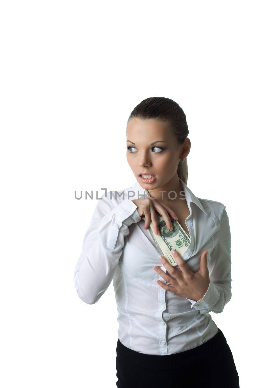 Sexy business woman hide a bundle of money isolated