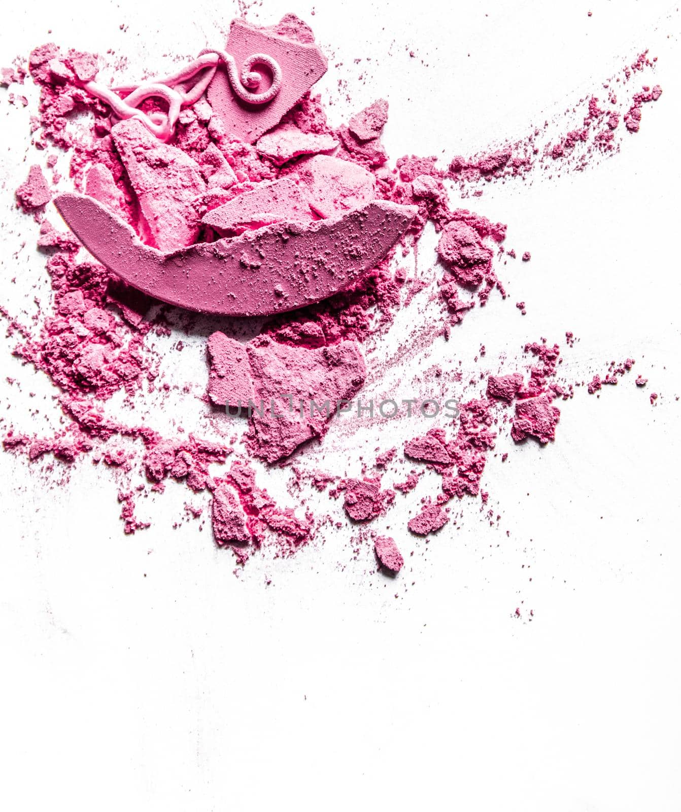 Beauty texture, cosmetic product and art of make-up concept - Crushed eyeshadows, lipstick and powder isolated on white background