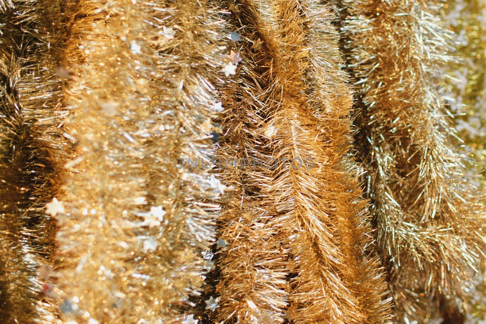 Golden tinsel for decoratin a Christmas tree