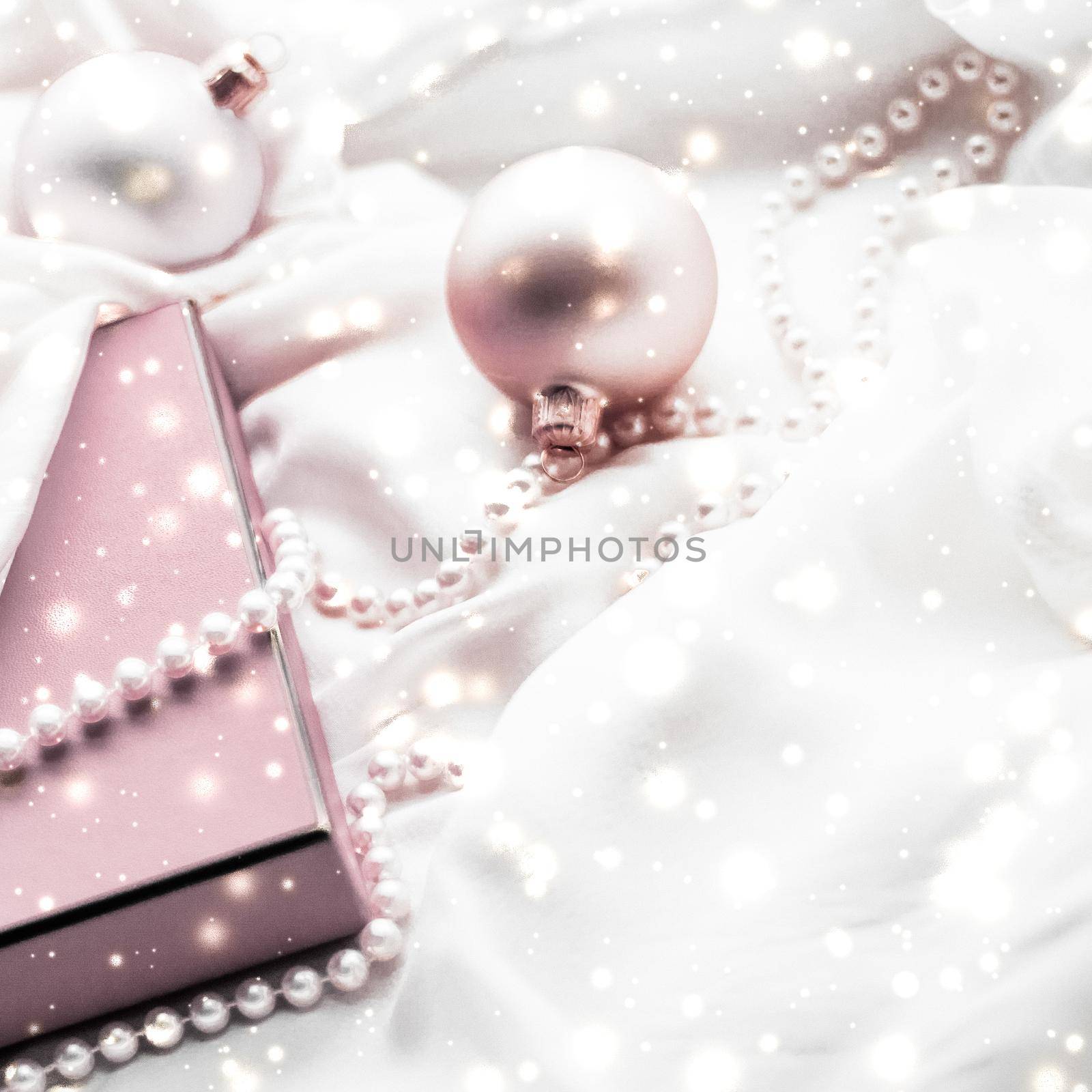 Holidays branding, glamour and decoration concept - Christmas magic holiday background, festive baubles, blush pink vintage gift box and gold glitter as winter season present for luxury brand design