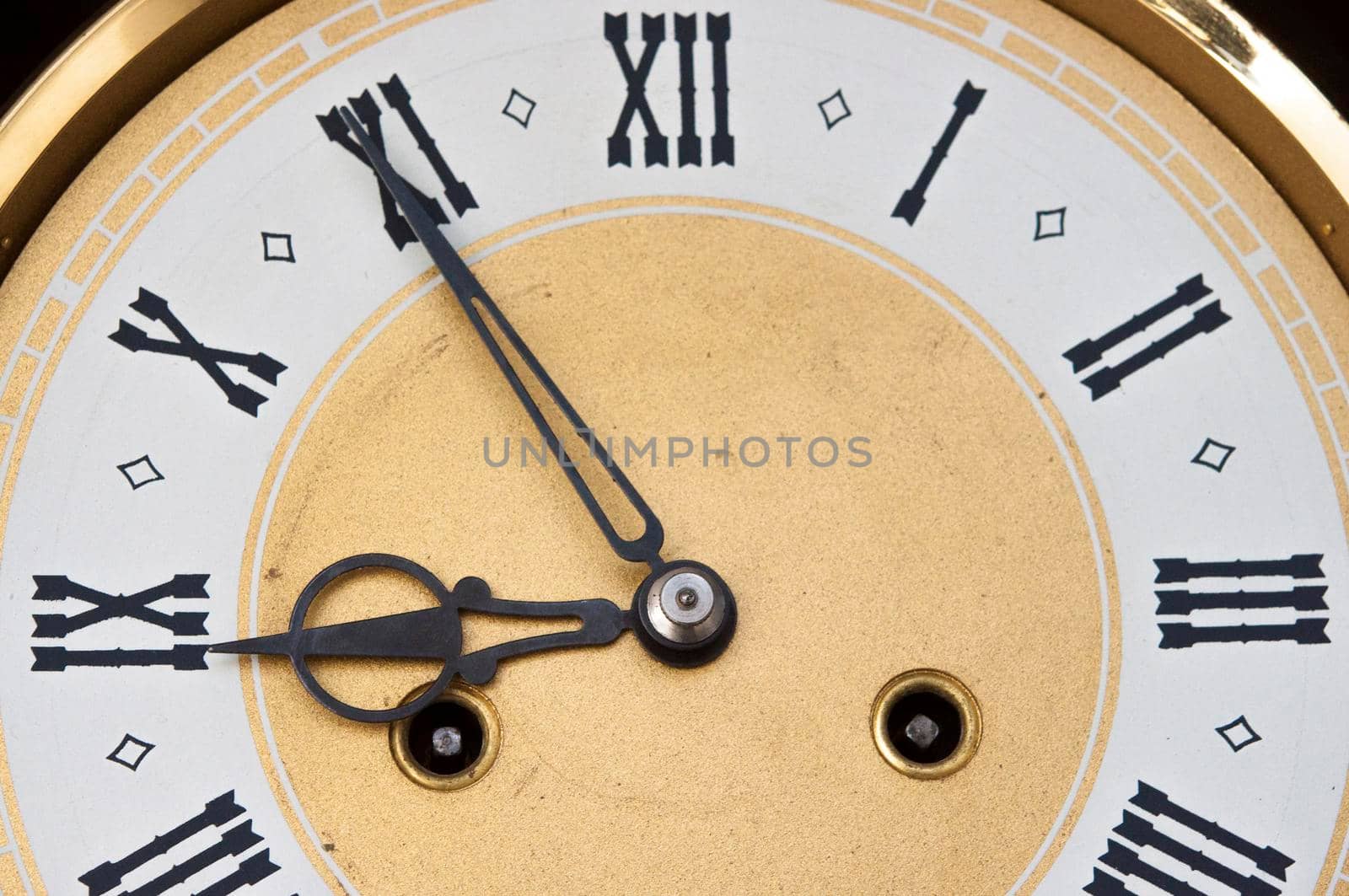 Front view of classic bronze clock 