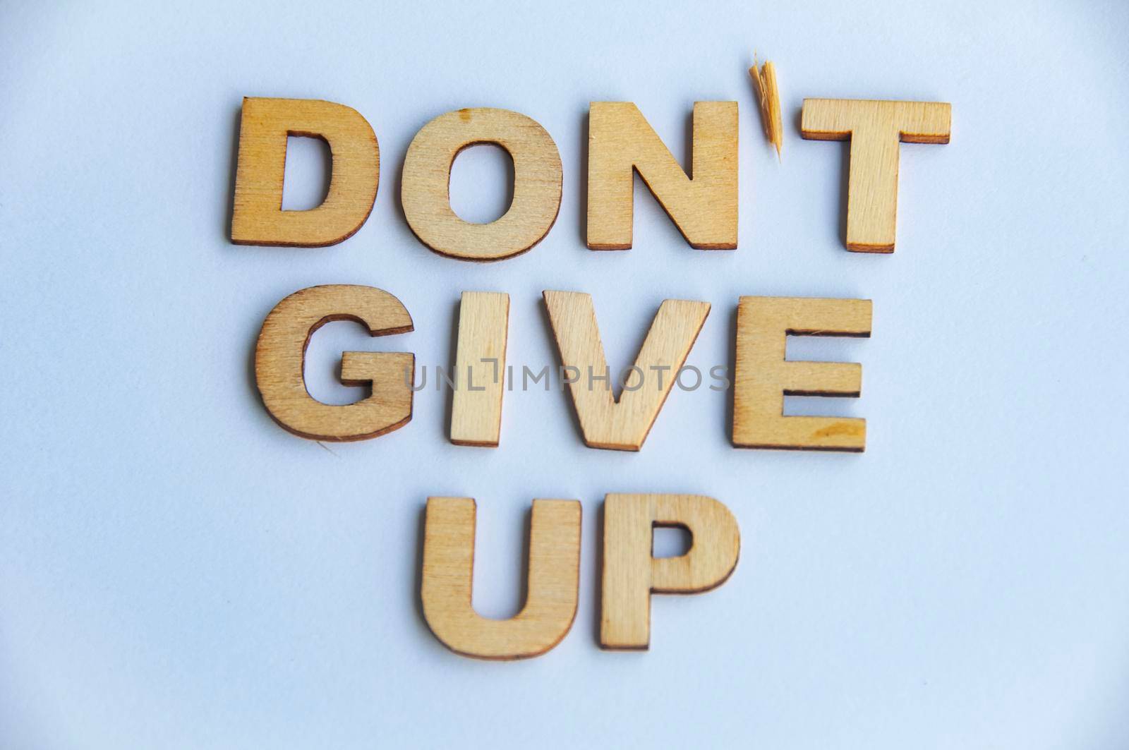 Do do give up text on white background.