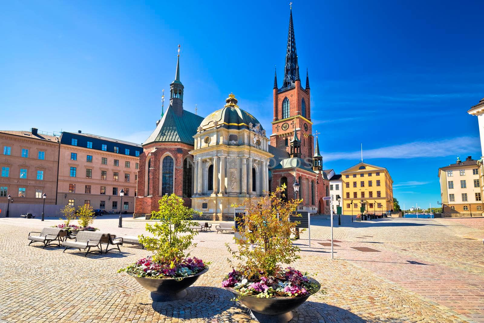 Riddarholmen Church and scenic square in Stockholm street view by xbrchx