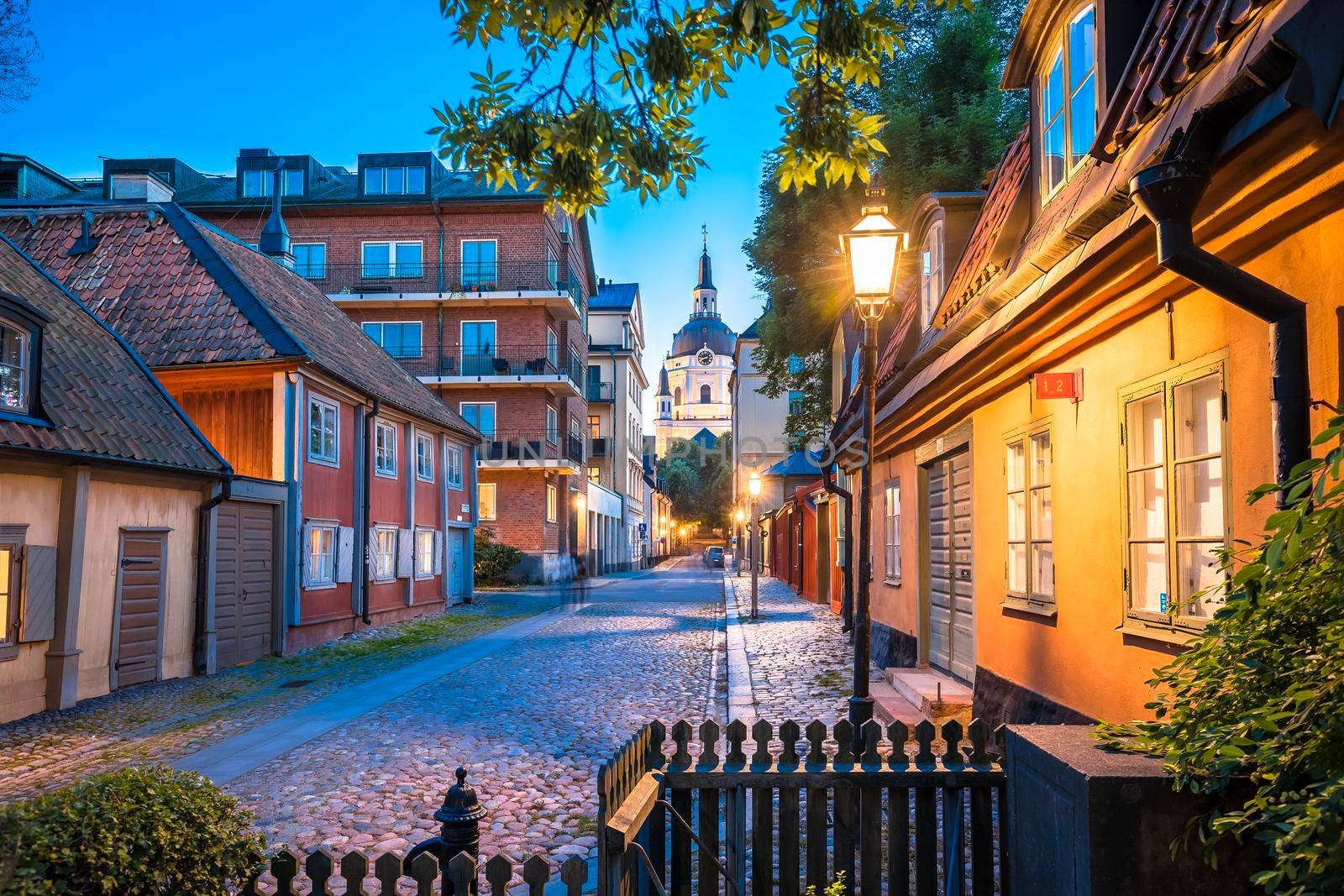 Colorful architecture of Stockholm old city center upper town evening view, Saint Katarina Parish church, capital of Sweden