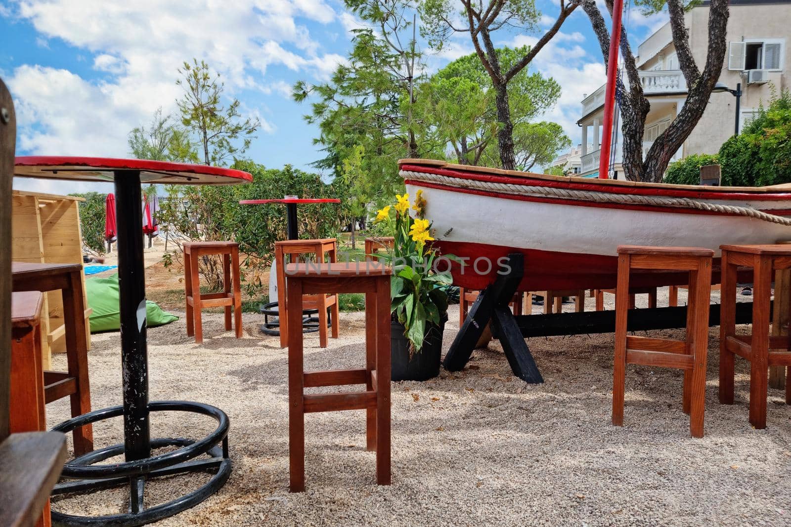 Wooden boat beach cafe view by xbrchx