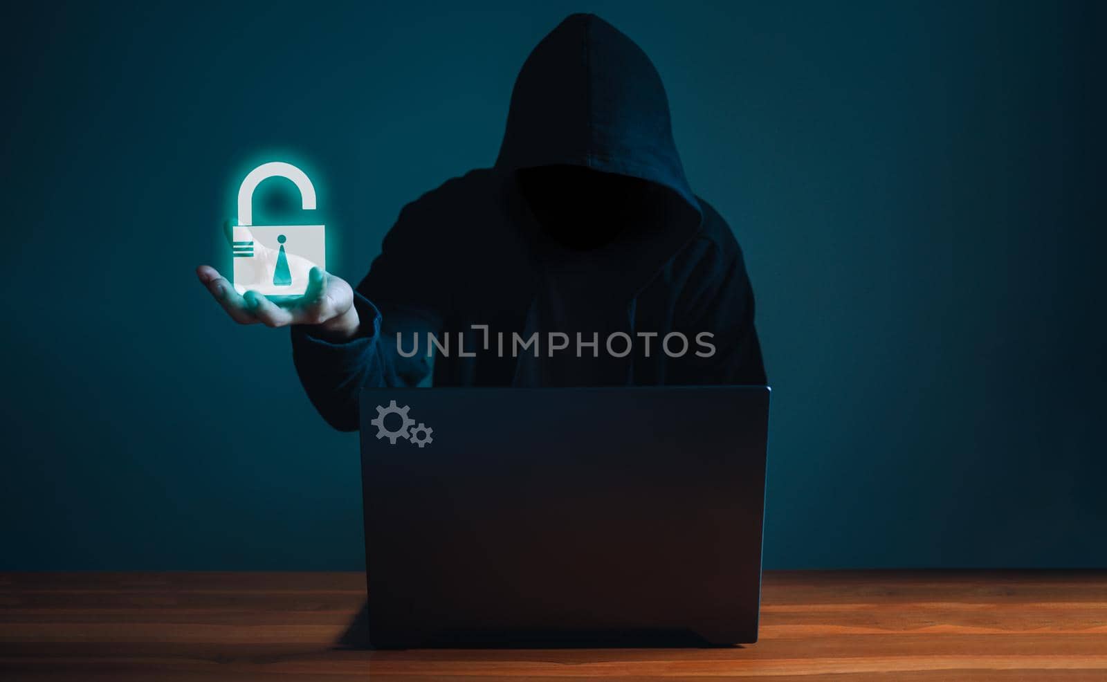 Hackers work on laptops in the dark. The concept of information security in the Internet network and information espionage. by Unimages2527