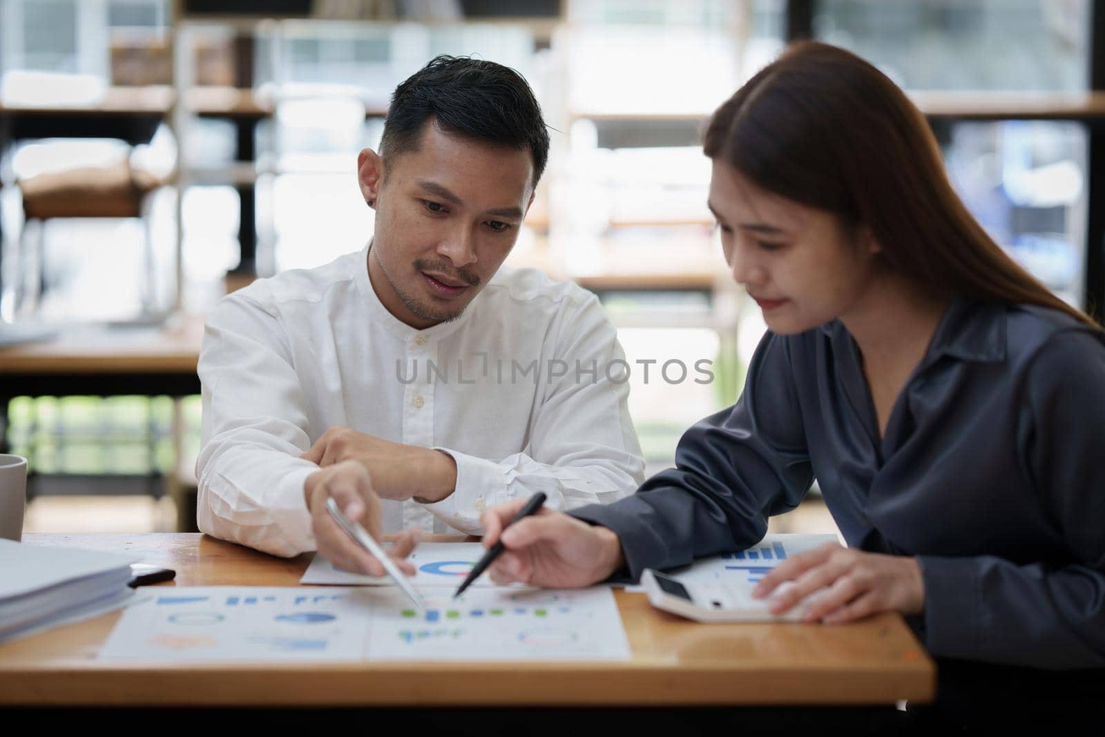 Business team hands at working with financial plan, meeting, discussion, brainstrom with tablet on office desk, Meeting concept by itchaznong