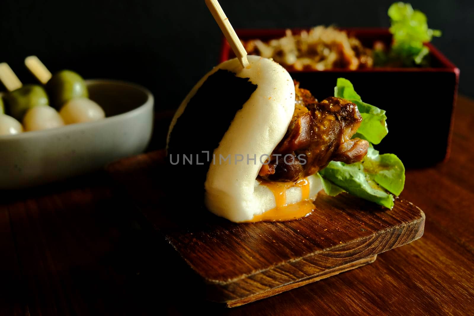 Hirata buns.  Japanese steamed buns filled with pork chashu, tempura, karaage. Japanese traditional food