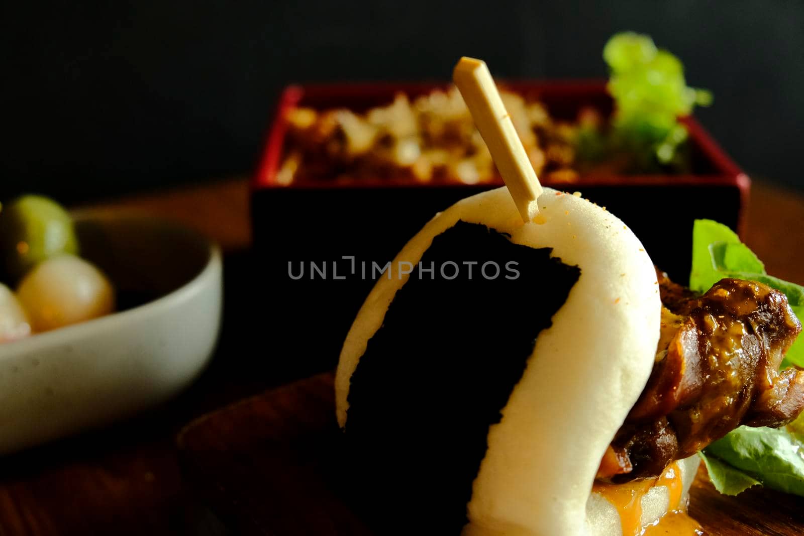 Hirata buns.  Japanese steamed buns filled with pork chashu, tempura, karaage. Japanese traditional food