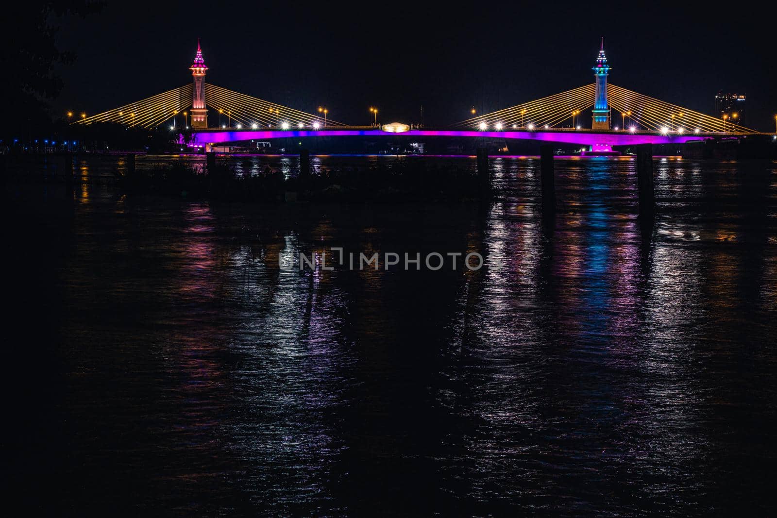 Suspension tensile structure Bridge Lighting Colorful and Bewitching Effects. Chesadabodin Bridge