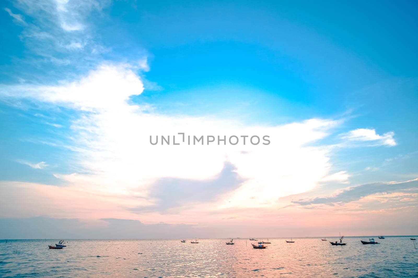 Panorama scene of tropical sea background with tropical wooden fishing boat blue tone
