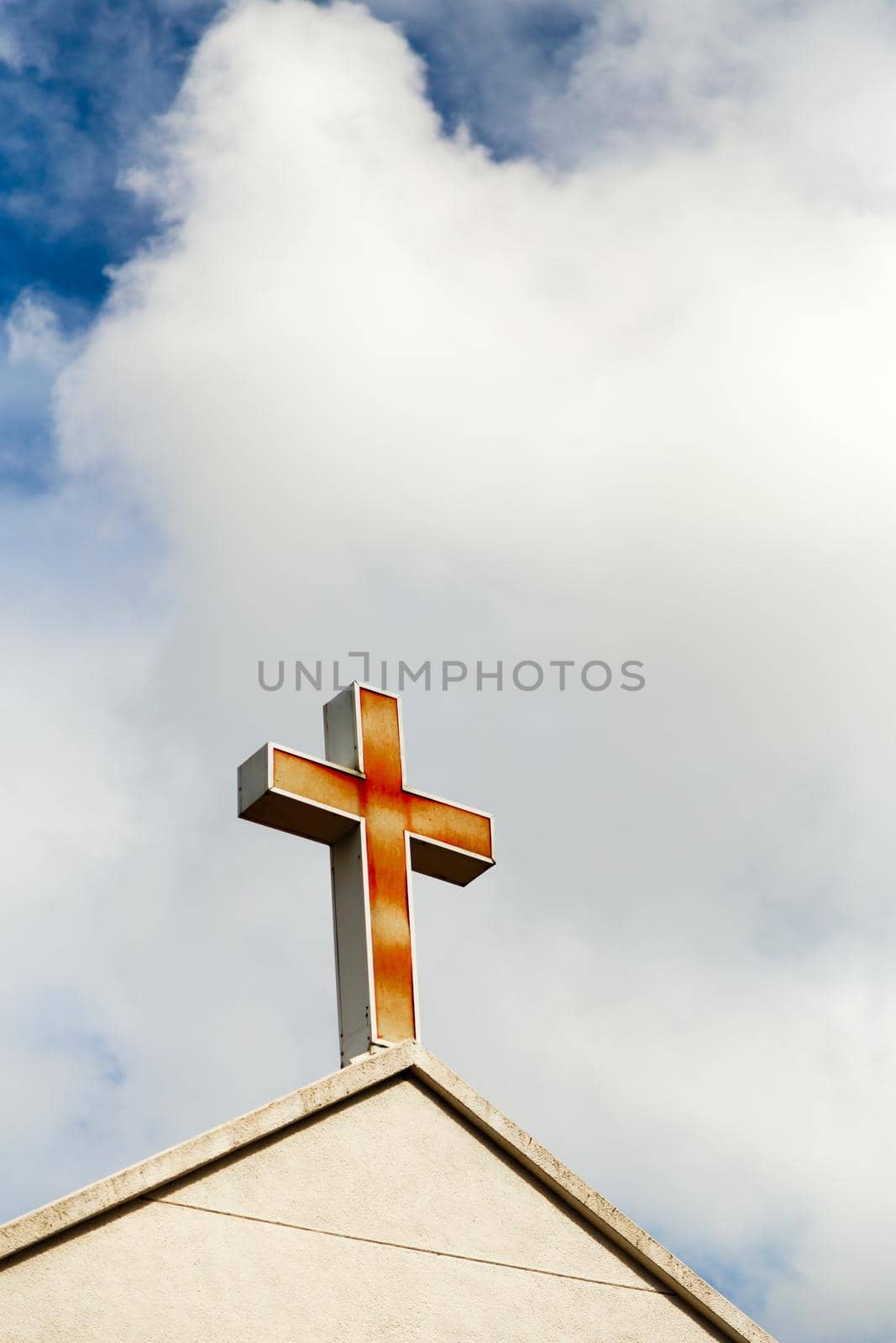 Faded cross on church roof by imagesbykenny