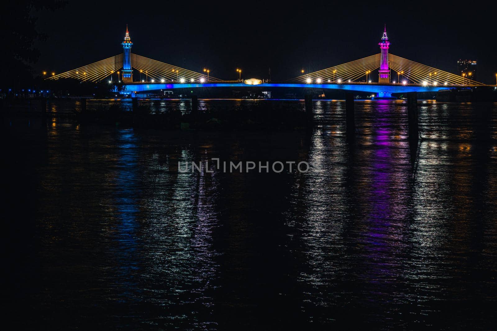 Suspension tensile structure Bridge Lighting Colorful and Bewitching Effects. Chesadabodin Bridge