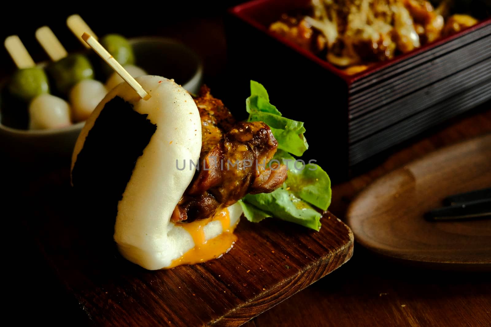 Hirata buns.  Japanese steamed buns filled with pork chashu, tempura, karaage. Japanese traditional food