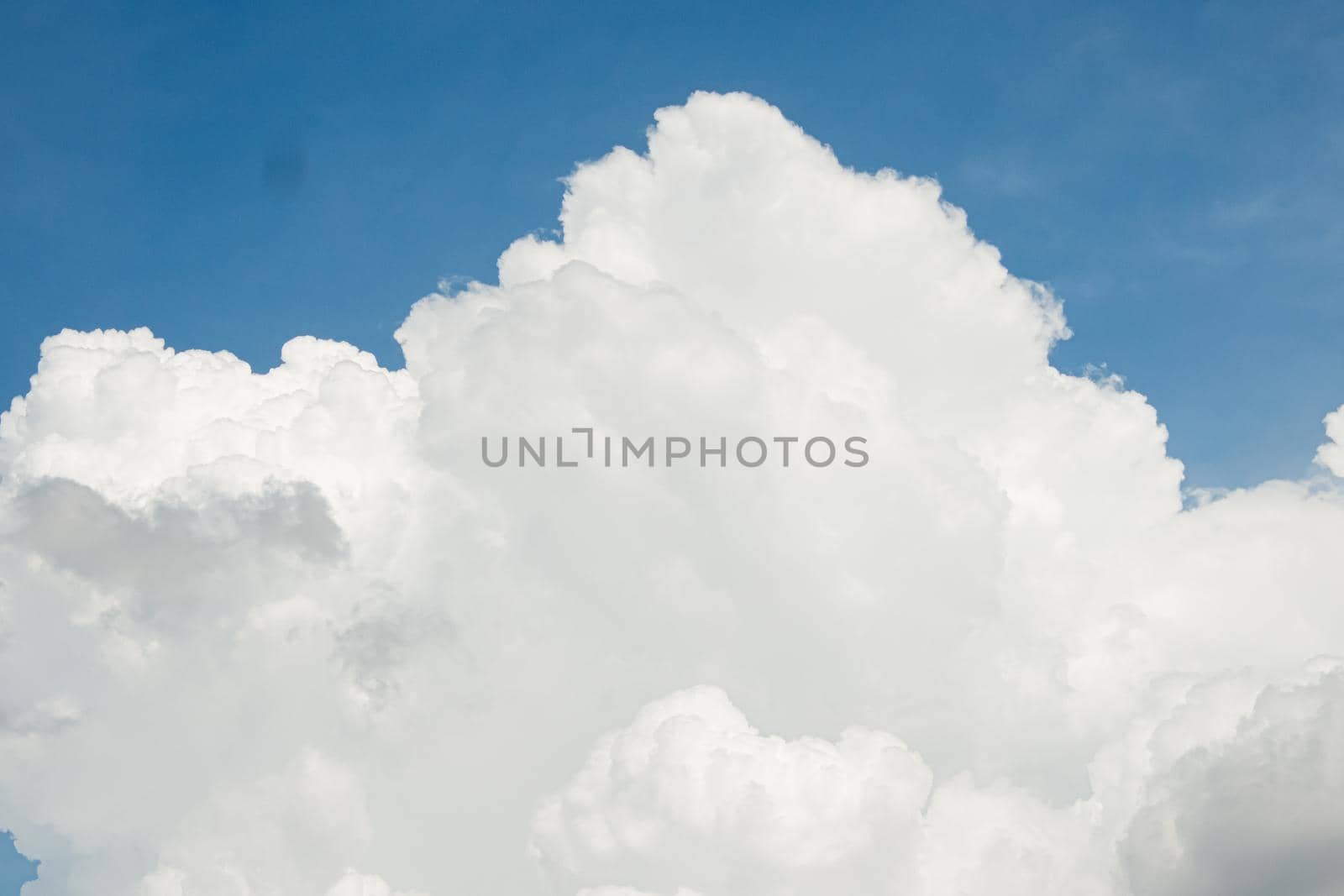 Panorama blue sky background with huge white clouds nature baclground