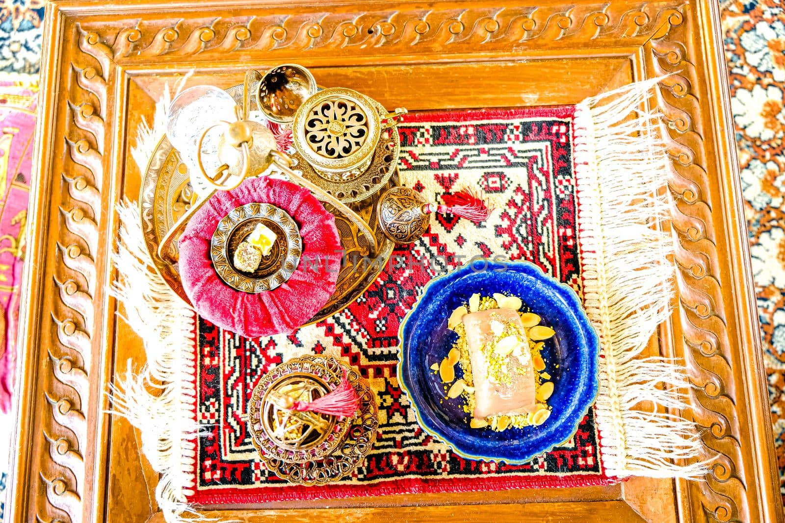 Turkish coffee and tea set in colorful traditional housewares with ice cream in Turkish theme coffee cafe