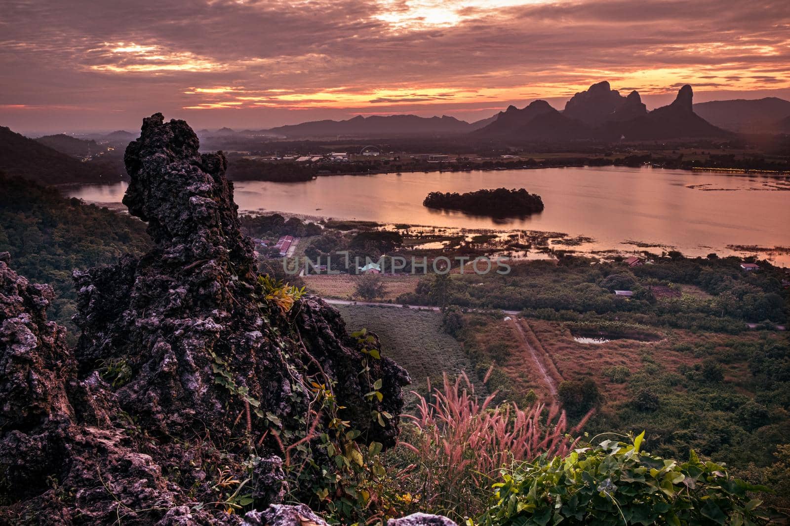 Panorama dramatic silhouettee mountain landscape at sunset in the sea